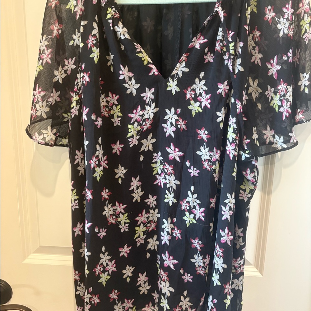 Lane Bryant flutter sleeve floral top.